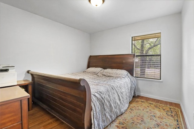 1313 Oakridge Dr, Blanco, TX 78606 - bedroom featuring wood finished floors and baseboards