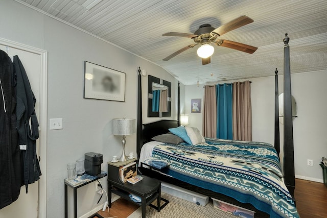 3780 Fm 972, Georgetown, TX 78673 - bedroom featuring wood finished floors, a ceiling fan, and baseboards