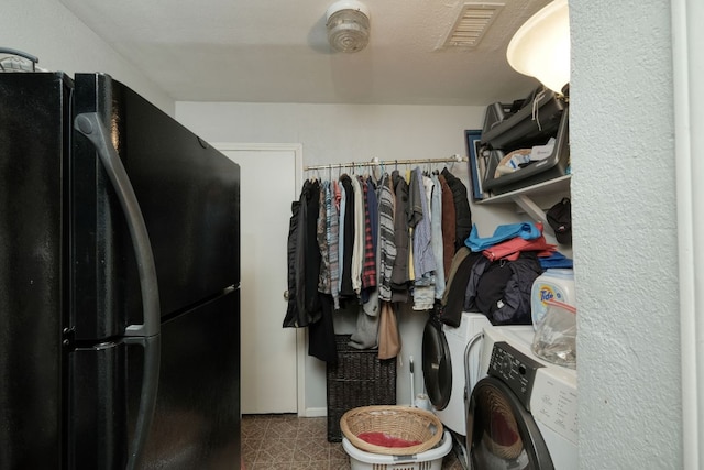 3780 Fm 972, Georgetown, TX 78673 - walk in closet with washer / dryer and tile patterned floors