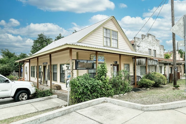 3780 Fm 972, Georgetown, TX 78673 - view of front of home featuring a porch and metal roof