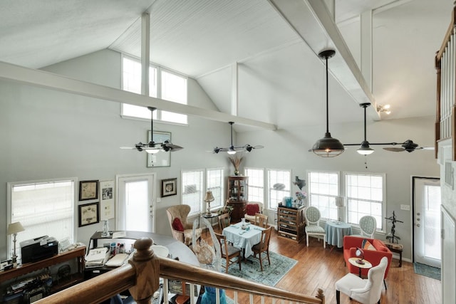 3780 Fm 972, Georgetown, TX 78673 - living area with a ceiling fan, high vaulted ceiling, wood finished floors, and plenty of natural light