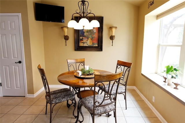 2721 Saddle Blanket Pl, Leander, TX 78641 - dining area with plenty of natural light, light tile patterned floors, and a chandelier
