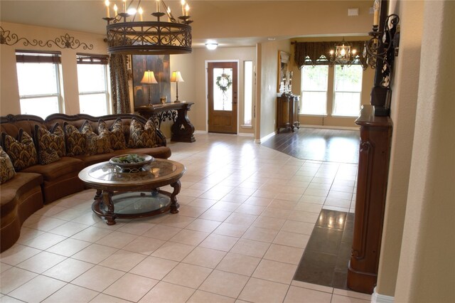 2721 Saddle Blanket Pl, Leander, TX 78641 - living area featuring a chandelier and light tile patterned floors