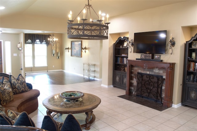 2721 Saddle Blanket Pl, Leander, TX 78641 - tiled living area with a chandelier and a fireplace