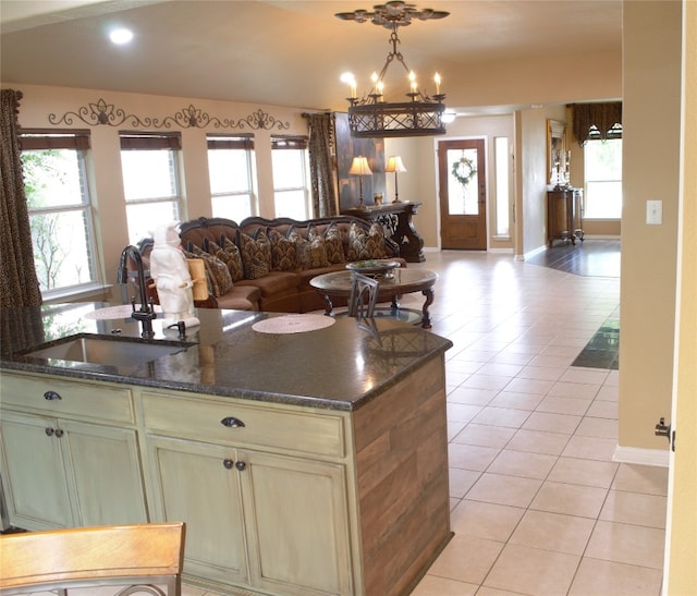 2721 Saddle Blanket Pl, Leander, TX 78641 - kitchen with open floor plan, light tile patterned flooring, plenty of natural light, and recessed lighting