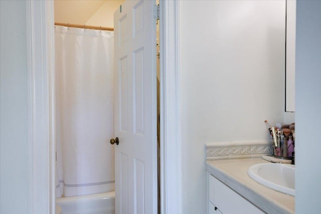 2509 Spring Ln, Austin, TX 78703 - bathroom with vanity and curtained shower