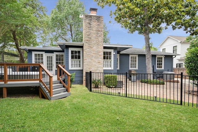2509 Spring Ln, Austin, TX 78703 - back of house with a chimney and a deck