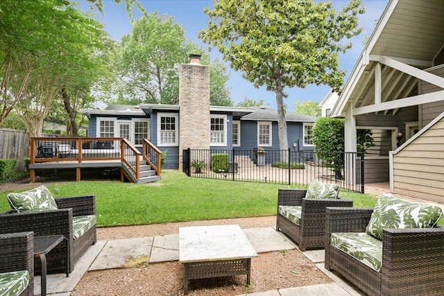 2509 Spring Ln, Austin, TX 78703 - rear view of property featuring a wooden deck, a chimney, an outdoor living space, and a patio