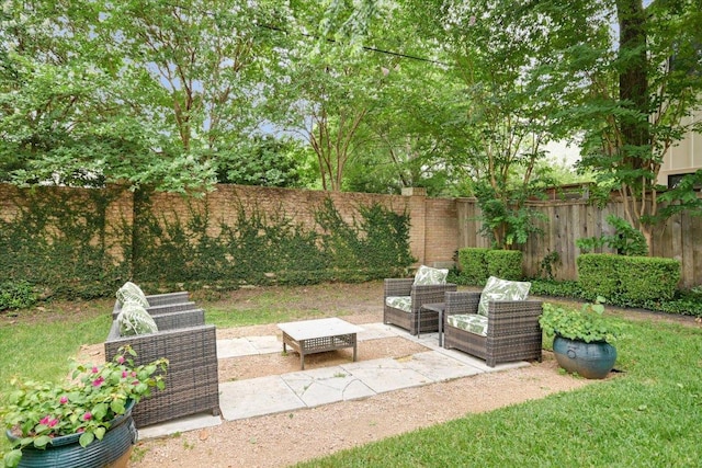 2509 Spring Ln, Austin, TX 78703 - fenced backyard with a patio and outdoor lounge area