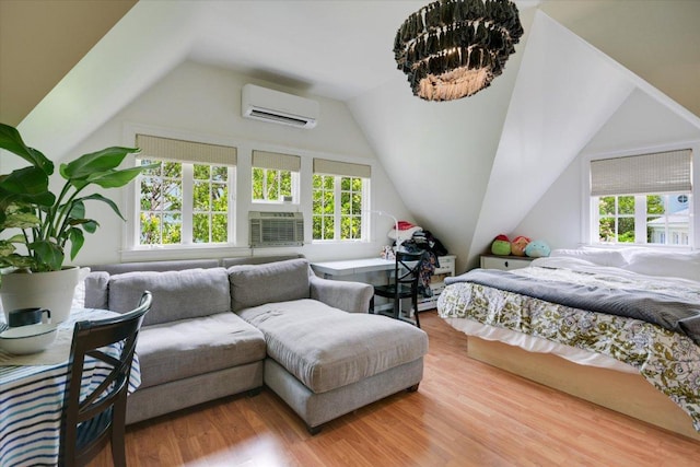 2509 Spring Ln, Austin, TX 78703 - bedroom with an AC wall unit, multiple windows, lofted ceiling, wood finished floors, and cooling unit