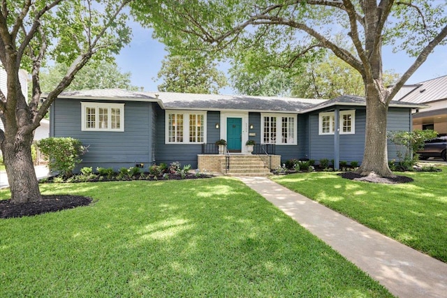 2509 Spring Ln, Austin, TX 78703 - ranch-style home with a front yard
