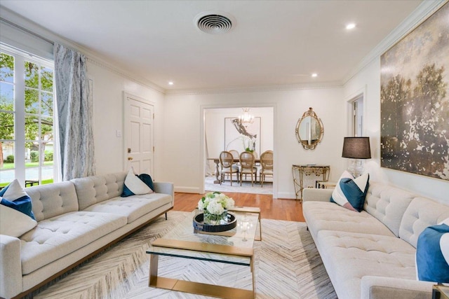 2509 Spring Ln, Austin, TX 78703 - living area featuring a chandelier, recessed lighting, crown molding, light wood-style flooring, and baseboards