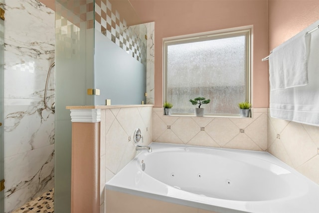 21105 Huckabee Bnd, Pflugerville, TX 78660 - full bathroom with a jetted tub, a marble finish shower, and vanity
