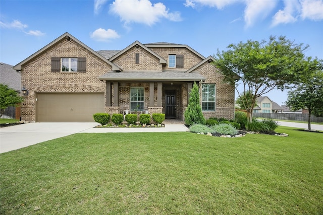 562 Stone River Dr, Austin, TX 78737 - view of front of property featuring brick siding, an attached garage, concrete driveway, covered porch, and roof with shingles