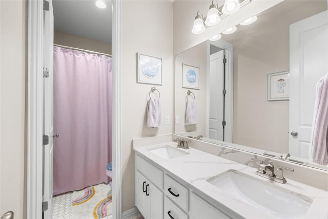 562 Stone River Dr, Austin, TX 78737 - full bathroom featuring double vanity and a shower with curtain