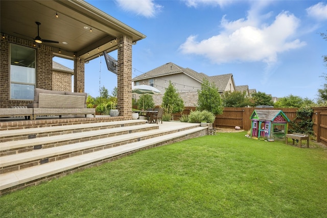 562 Stone River Dr, Austin, TX 78737 - view of yard with a ceiling fan and a patio