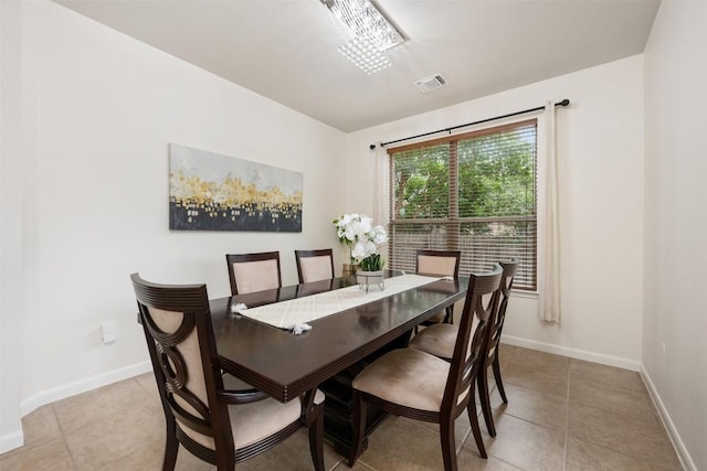 112 Bearing Cv, Austin, TX 78717 - dining area with light tile patterned floors and baseboards