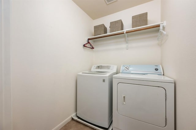 112 Bearing Cv, Austin, TX 78717 - laundry room with washer and dryer and baseboards