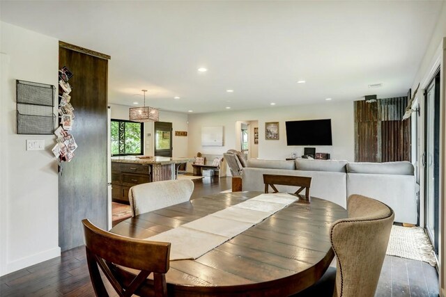 11700 Rim Rock Trl, Austin, TX 78737 - dining area with dark wood-style floors and recessed lighting