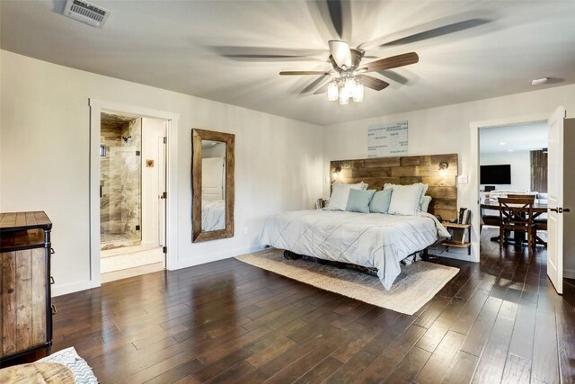 11700 Rim Rock Trl, Austin, TX 78737 - bedroom with dark wood finished floors, a ceiling fan, and ensuite bath