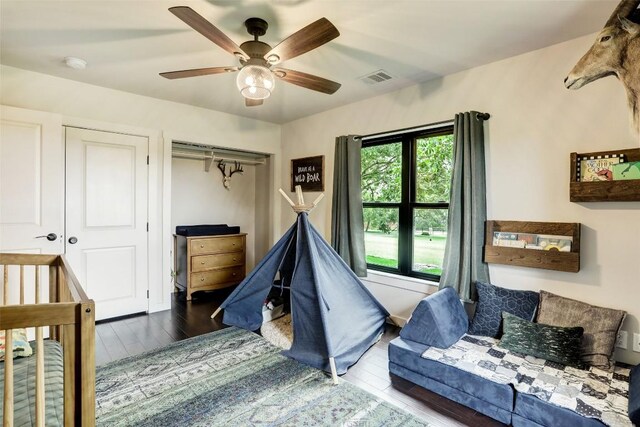 11700 Rim Rock Trl, Austin, TX 78737 - bedroom with wood finished floors and ceiling fan