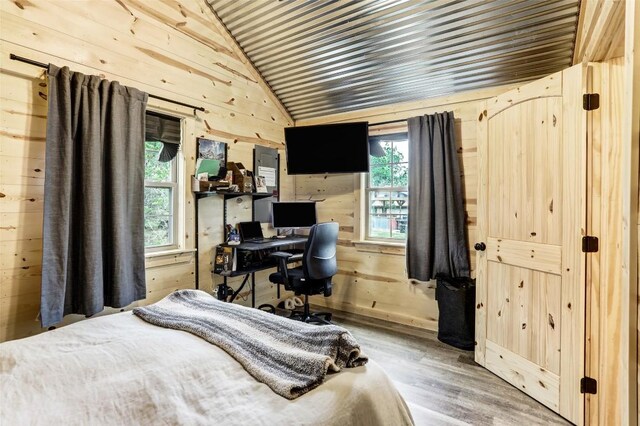 11700 Rim Rock Trl, Austin, TX 78737 - bedroom featuring wood walls, lofted ceiling, wood finished floors, and wood ceiling