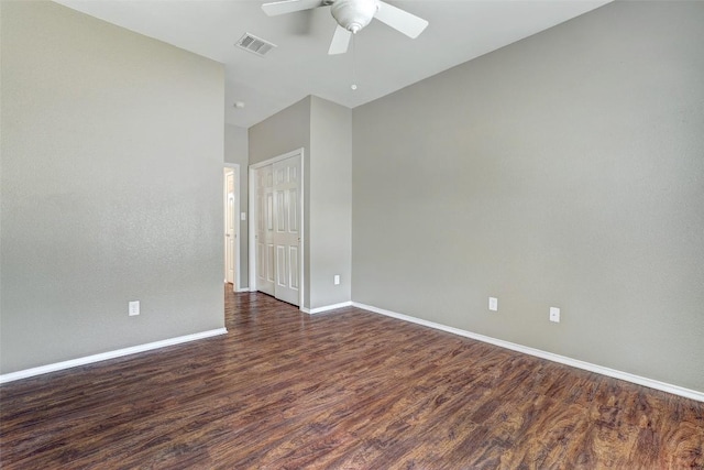 1003 E 3rd St, Georgetown, TX 78626 - empty room featuring wood finished floors, a ceiling fan, and baseboards