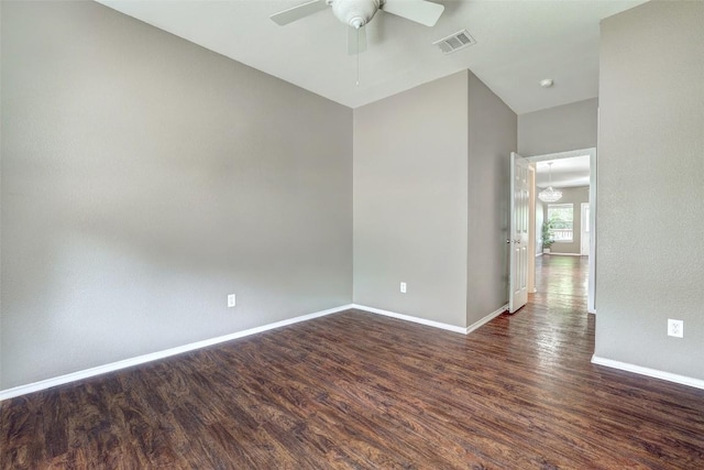 1003 E 3rd St, Georgetown, TX 78626 - spare room featuring wood finished floors, ceiling fan, and baseboards