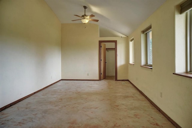 123 Konahuanui Ln, Bastrop, TX 78602 - carpeted spare room featuring ceiling fan, lofted ceiling, and baseboards