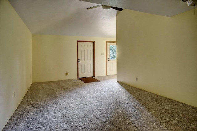 123 Konahuanui Ln, Bastrop, TX 78602 - empty room with a ceiling fan, carpet flooring, and lofted ceiling