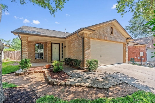 1011 Moser River Dr, Leander, TX 78641 - single story home with a garage, driveway, and brick siding
