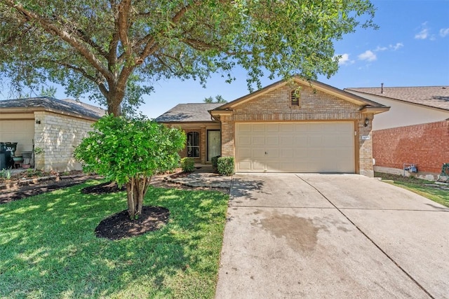 1011 Moser River Dr, Leander, TX 78641 - ranch-style house with brick siding, an attached garage, driveway, and a front lawn
