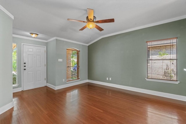 1011 Moser River Dr, Leander, TX 78641 - foyer with ornamental molding, baseboards, wood finished floors, and ceiling fan