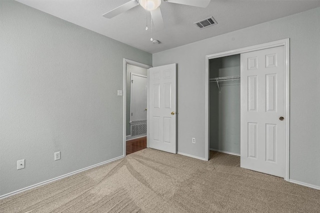 1011 Moser River Dr, Leander, TX 78641 - unfurnished bedroom featuring carpet flooring, baseboards, a closet, and a ceiling fan