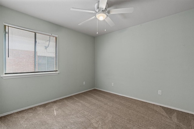 1011 Moser River Dr, Leander, TX 78641 - unfurnished room featuring carpet floors, a ceiling fan, and baseboards