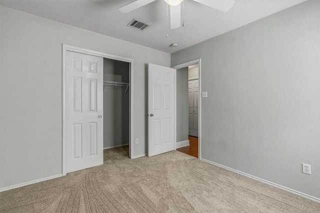 1011 Moser River Dr, Leander, TX 78641 - unfurnished bedroom with carpet, a closet, baseboards, and a ceiling fan