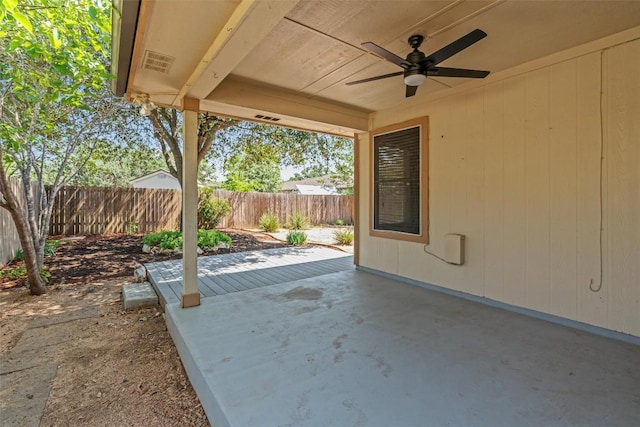 1011 Moser River Dr, Leander, TX 78641 - fenced backyard featuring a ceiling fan and a patio