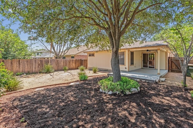 1011 Moser River Dr, Leander, TX 78641 - rear view of house featuring a patio area and a fenced backyard