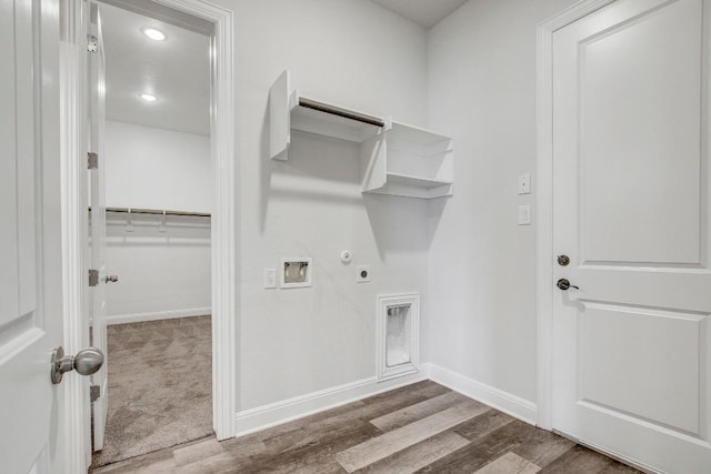 1905 Mariann Dr, Leander, TX 78641 - laundry area with hookup for a gas dryer, electric dryer hookup, hookup for a washing machine, wood finished floors, and recessed lighting