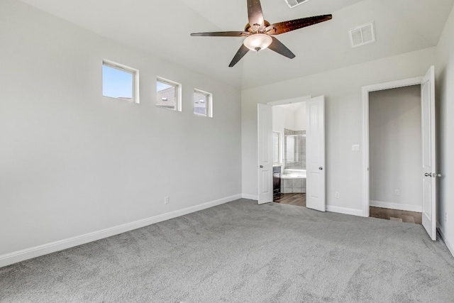 1905 Mariann Dr, Leander, TX 78641 - unfurnished bedroom with carpet flooring, ensuite bath, and ceiling fan
