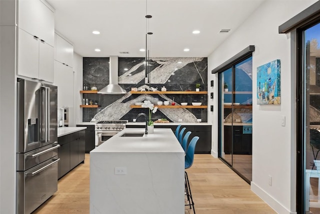 14417 Cochise Trl, Austin, TX 78734 - kitchen with stainless steel appliances, a sink, modern cabinets, open shelves, and light countertops
