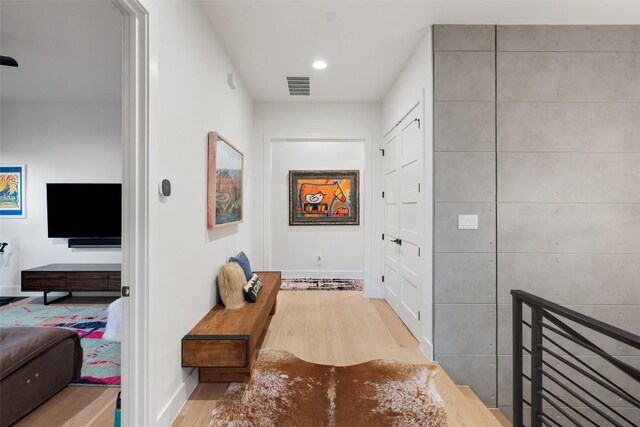 14417 Cochise Trl, Austin, TX 78734 - hall featuring wood finished floors, baseboards, and recessed lighting