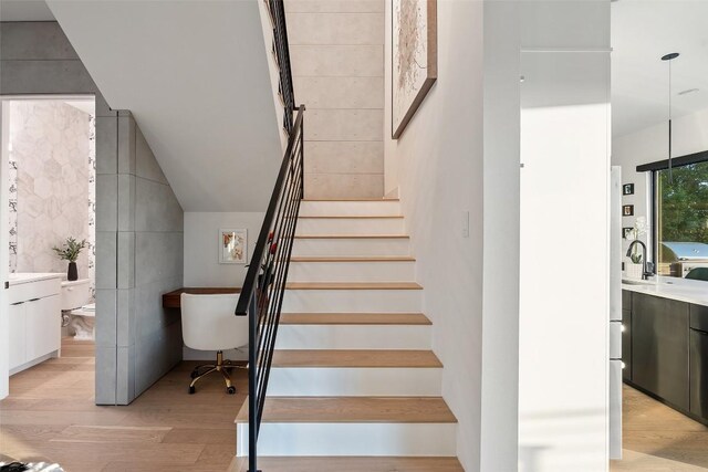 14417 Cochise Trl, Austin, TX 78734 - staircase featuring wood finished floors
