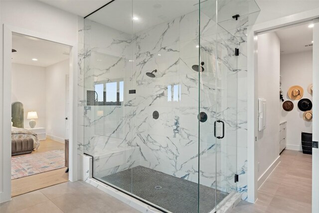 14417 Cochise Trl, Austin, TX 78734 - ensuite bathroom with a marble finish shower and recessed lighting