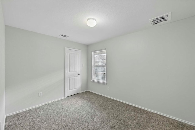 146 Blair Ct, San Marcos, TX 78666 - carpeted spare room featuring baseboards