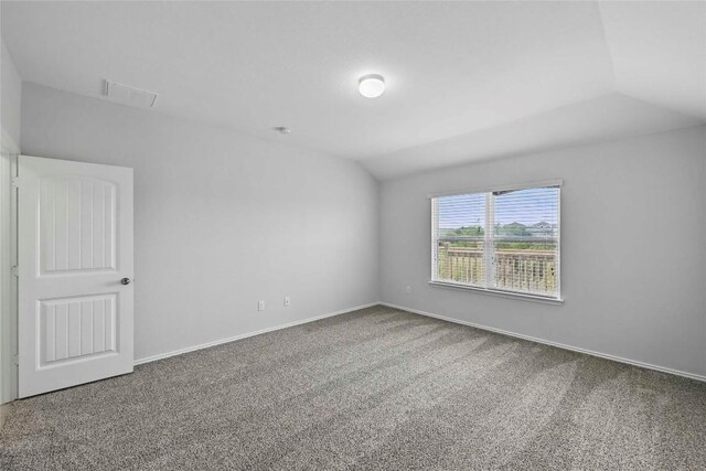 146 Blair Ct, San Marcos, TX 78666 - unfurnished room with carpet flooring and vaulted ceiling