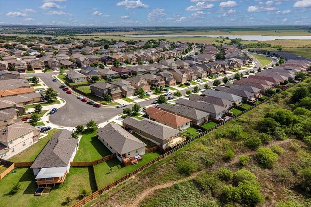 146 Blair Ct, San Marcos, TX 78666 - aerial view of property's location featuring nearby suburban area and a large body of water