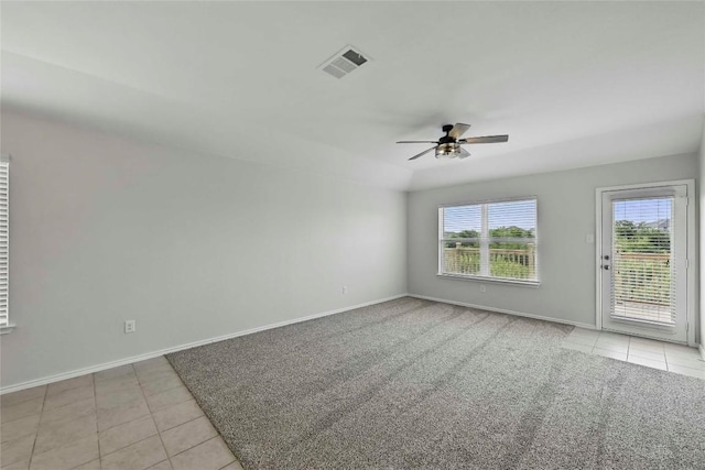 146 Blair Ct, San Marcos, TX 78666 - empty room featuring ceiling fan, light tile patterned floors, and light colored carpet