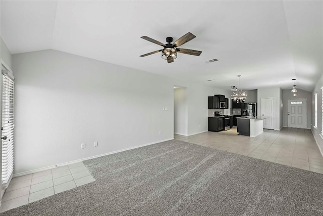 146 Blair Ct, San Marcos, TX 78666 - unfurnished living room featuring light tile patterned floors, a ceiling fan, a chandelier, lofted ceiling, and light carpet