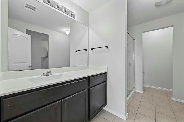 146 Blair Ct, San Marcos, TX 78666 - full bath featuring vanity, a stall shower, and tile patterned floors